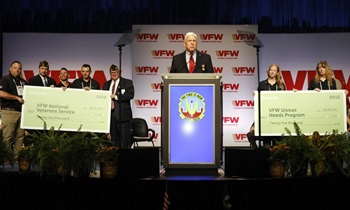 The Humana team proudly presents a $25,000 check to the VFW Unmet Needs program and a $25,000 check to the VFW National Veterans Service program